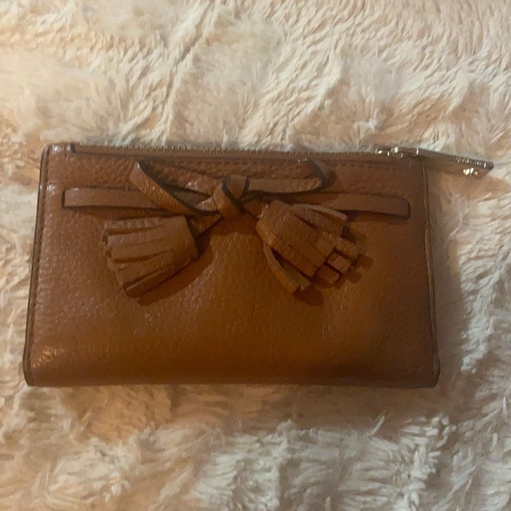 Kate Spade brown leather wallet with red interior